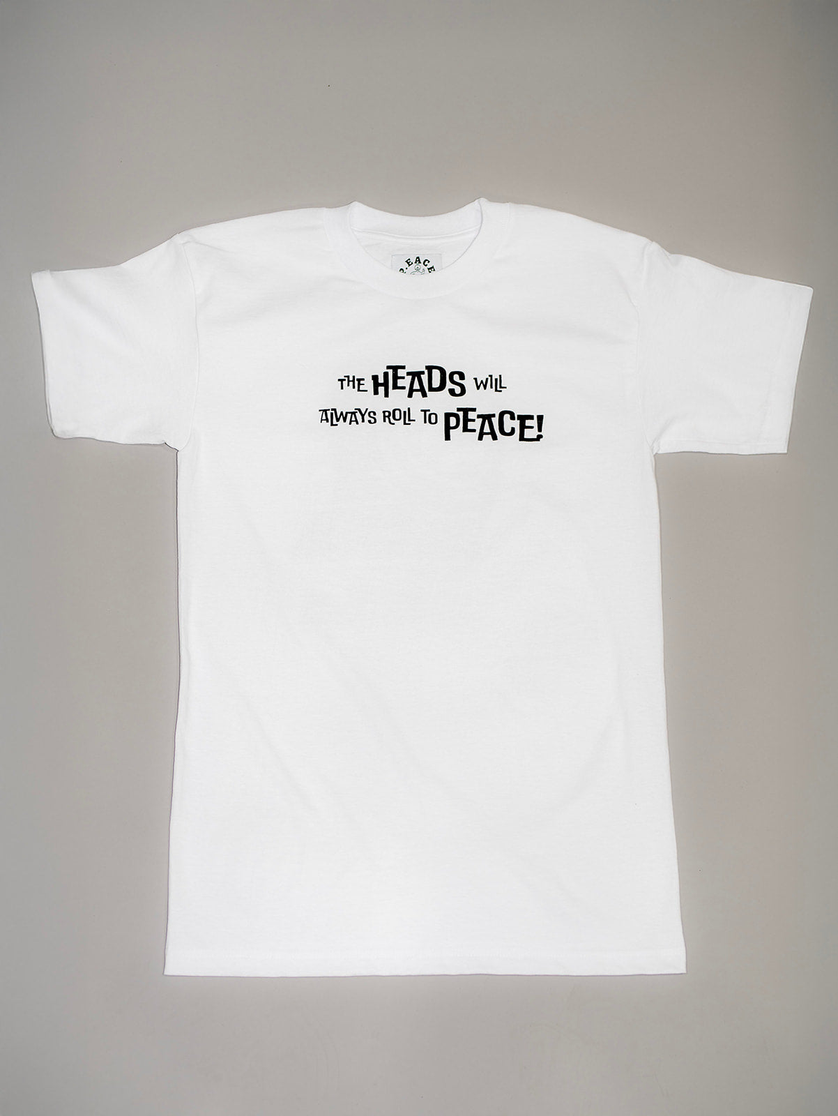 HEADS WILL ALWAYS ROLL TO PEACE TEE!