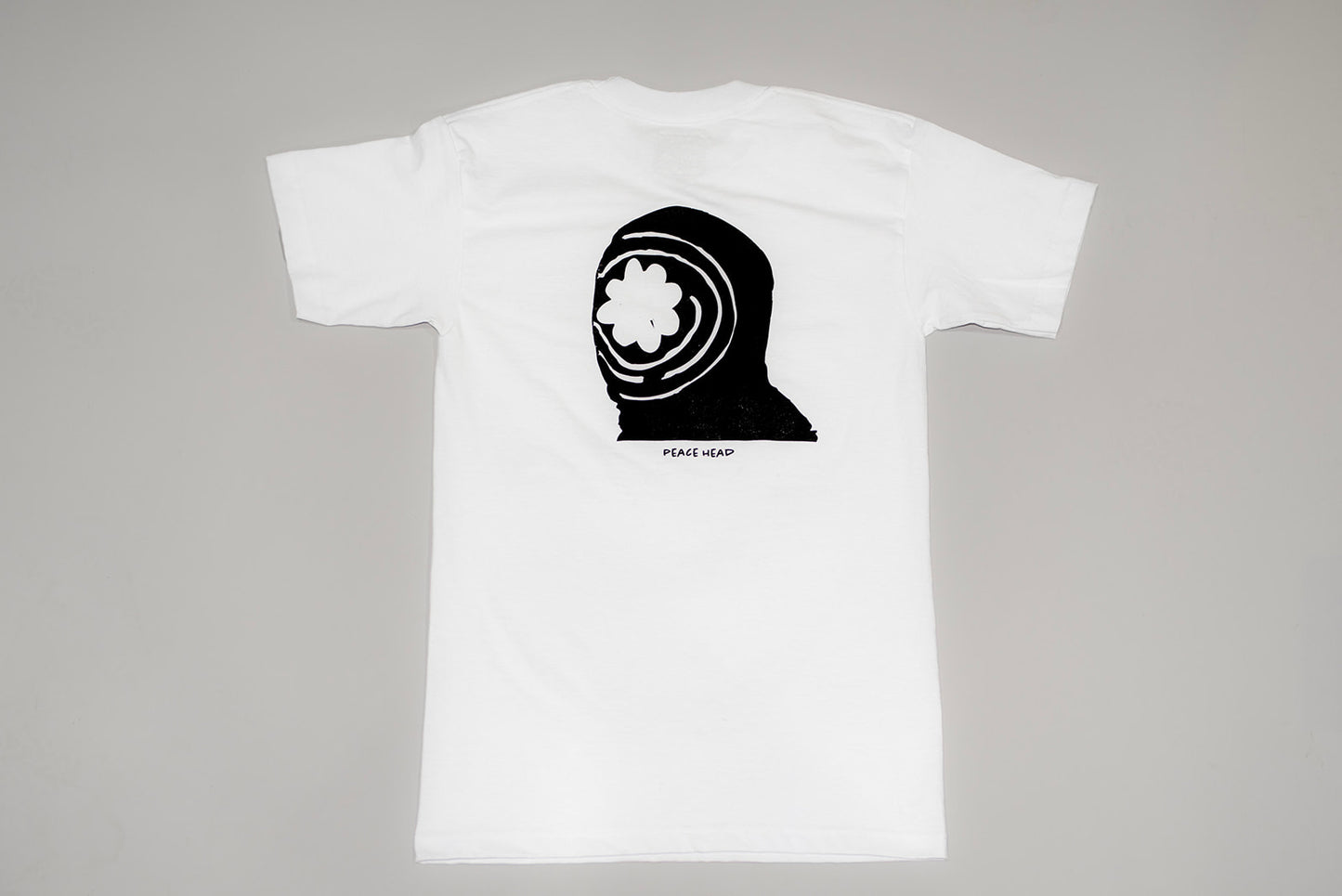 HEADS WILL ALWAYS ROLL TO PEACE TEE!
