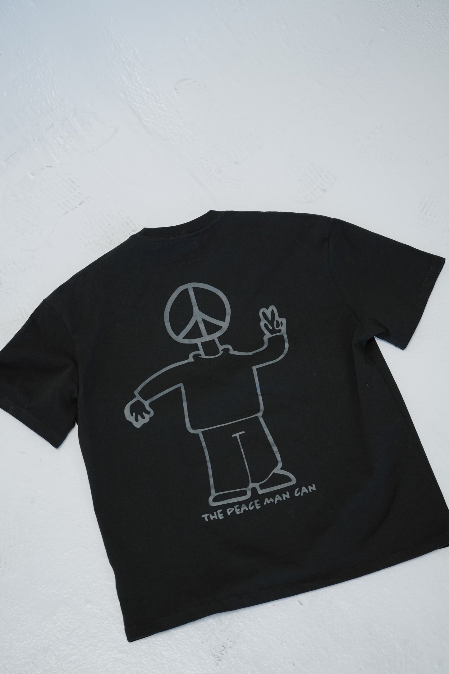 PEACE MAN CAN TEE!¡ BLACK